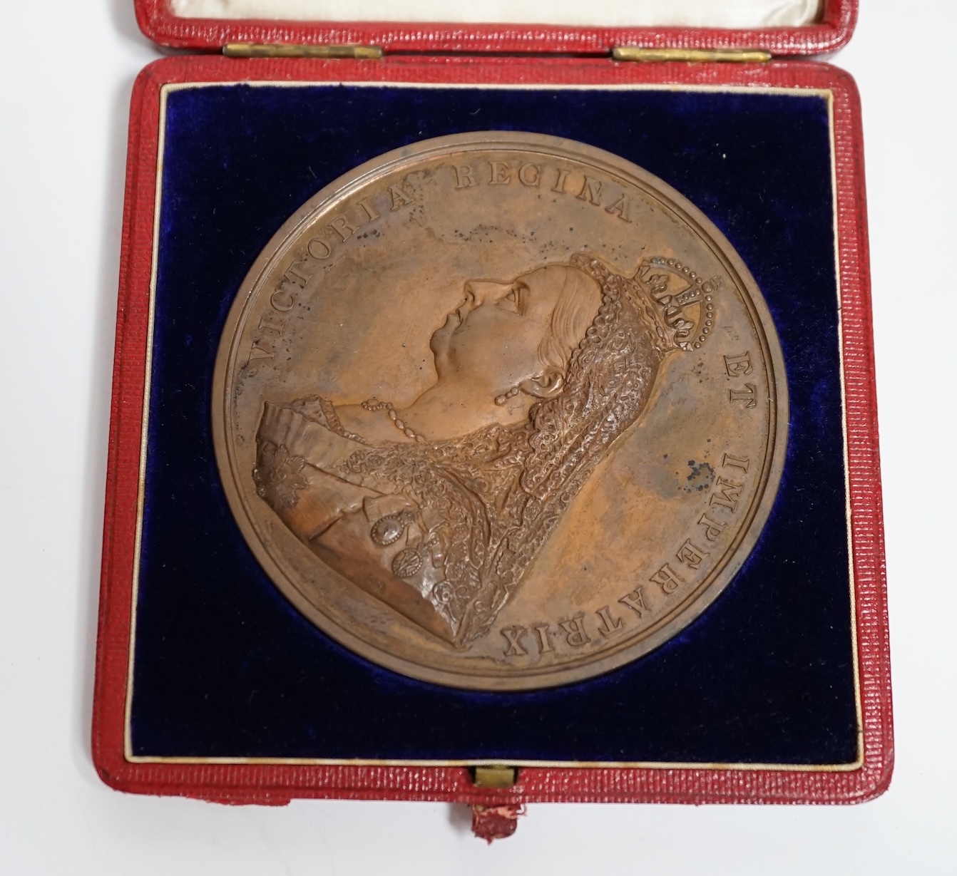 A Queen Victoria commemorative cased 1887 bronze Jubilee medal